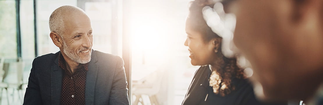 Couple with a financial advisor.